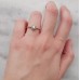 Ροζ χρυσό μονόπετρο δαχτυλίδι Κ14 με λευκά ζιργκόν